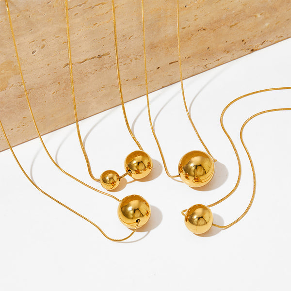 Hollow ball pendant necklace