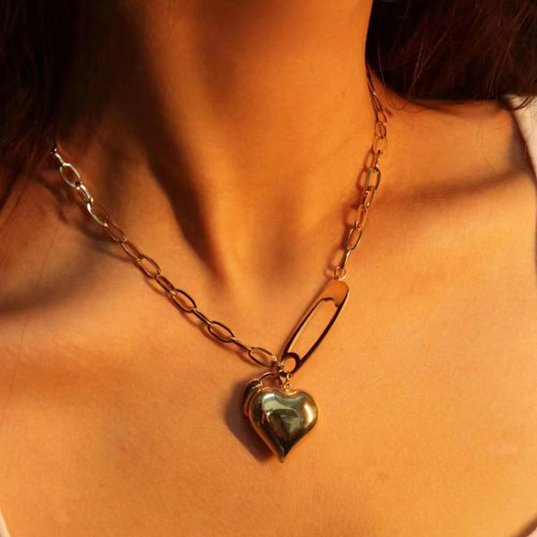 Gold plated peach heart necklace