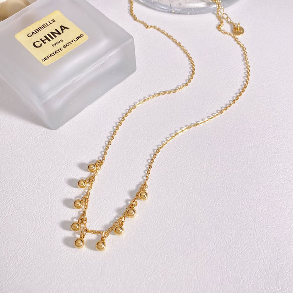 Electroplated gold small round bead fringed necklace